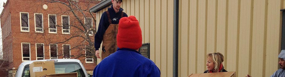 Facilities employees loading items into a truck